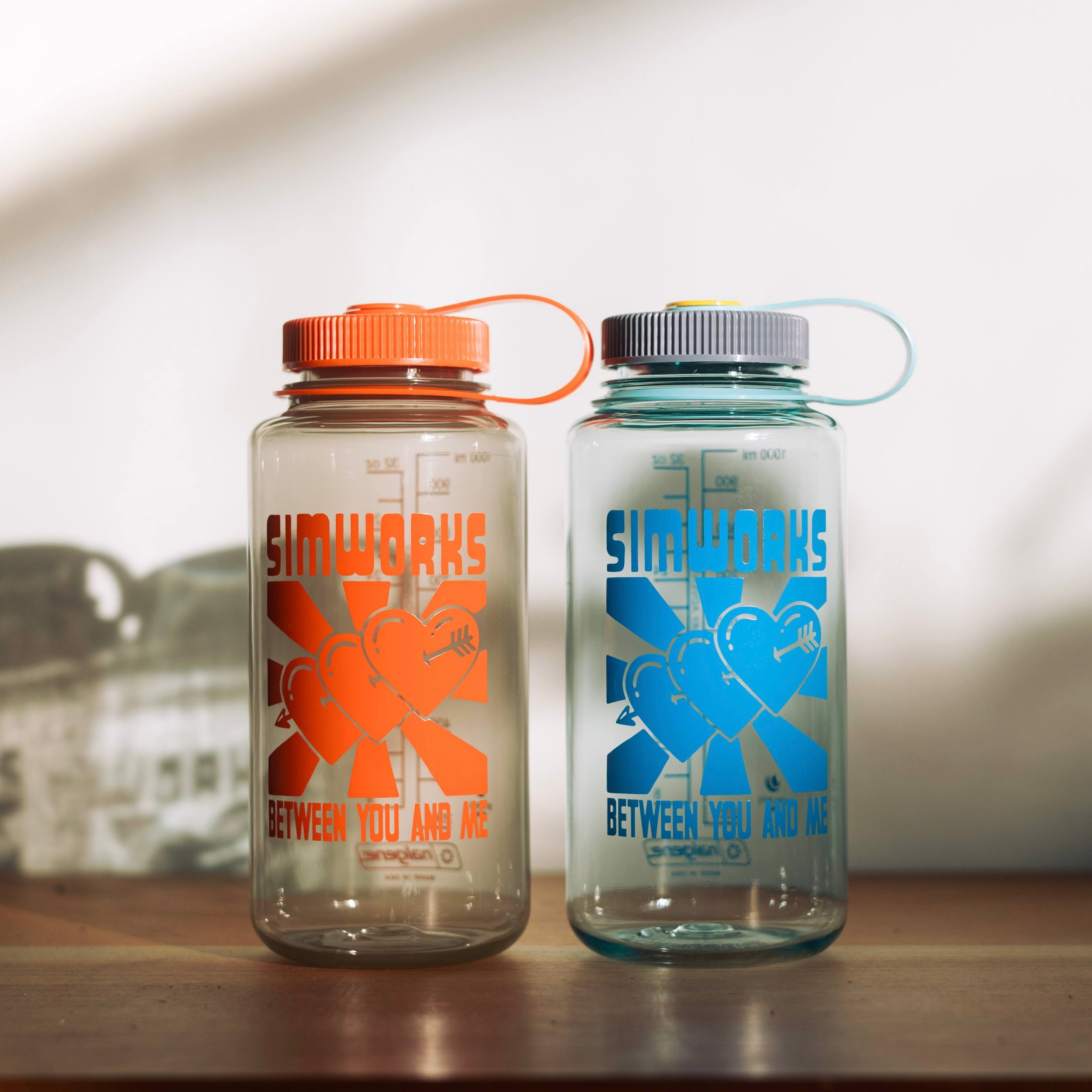 SIMWORKS 'Rising Hearts' Nalgene Bottle – SimWorks Online Store
